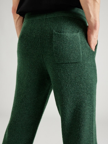 ABOUT YOU x Jaime Lorente Tapered Pants 'Taylan' in Green