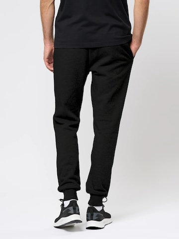 KAPPA Tapered Housut 'Caseri' värissä musta
