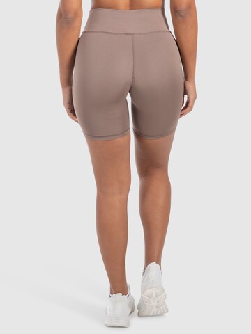 Skinny Pantalon de sport Smilodox en marron
