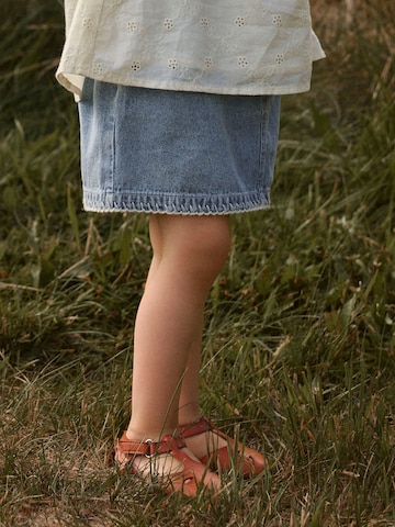 Lil'Atelier Rock in Blau: Vorderseite