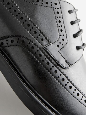 Next - Zapatos con cordón en negro