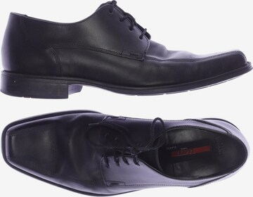 LLOYD Flats & Loafers in 41 in Black: front