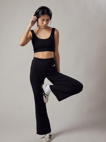 Pantaloni 'Panta Palazzo in Interlock' di OWN Off With Nature in nero: frontale