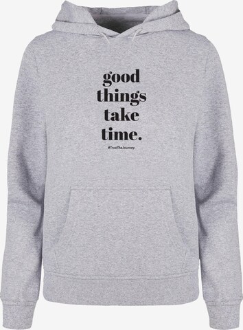 Sweat-shirt 'Good Things Take Time' Merchcode en gris : devant