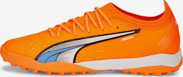 PUMA Soccer Cleats in Orange: front