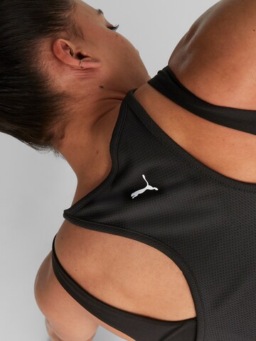 PUMA Sporttop in Schwarz