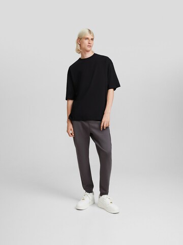 Bershka Tapered Broek in Grijs