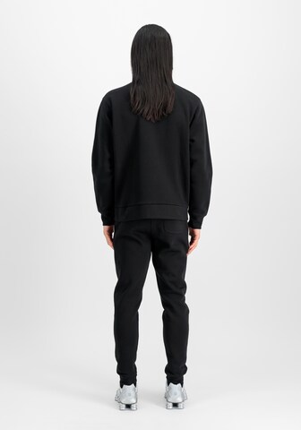 regular Pantaloni sportivi di ALPHA INDUSTRIES in nero