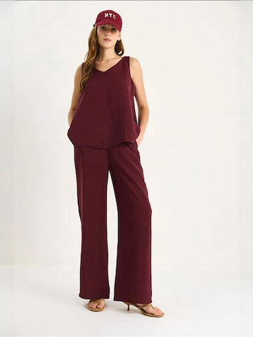 Pantalons de tailleur Bianco Lucci en rouge
