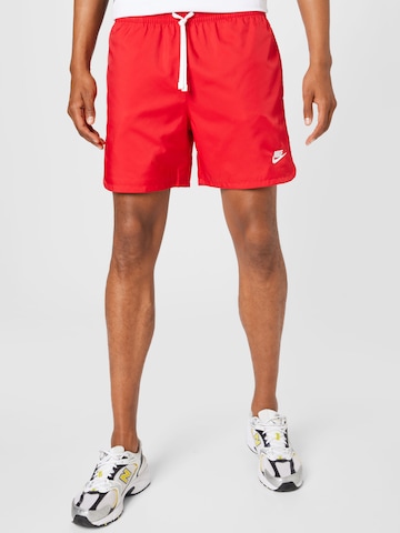 Nike Sportswear - Regular Calças 'Essentials' em vermelho: frente