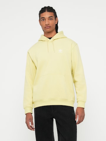 ADIDAS ORIGINALSSweater majica 'ESS' - žuta boja: prednji dio