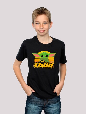 F4NT4STIC Shirt 'Star Wars The Mandalorian The Child Retro' in Zwart: voorkant