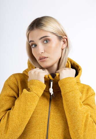 Manteau en tricot Schmuddelwedda en jaune