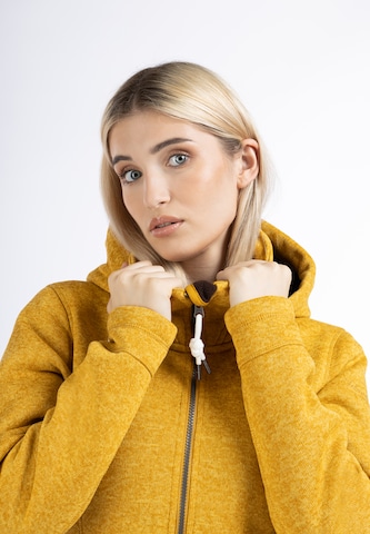 Manteau en tricot Schmuddelwedda en jaune