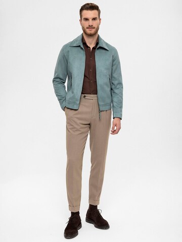 Antioch Between-season jacket in Green