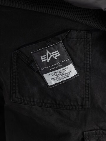 ALPHA INDUSTRIES Regular Cargohose 'Aivator'‌‌‌‌ in Schwarz