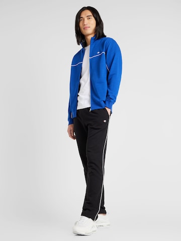 Champion Authentic Athletic Apparel Tracksuit in Blue