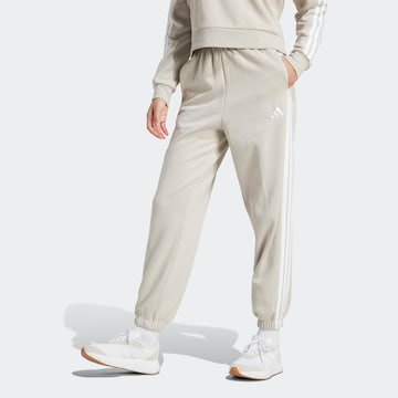 ADIDAS SPORTSWEAR Tapered Workout Pants in Beige: front