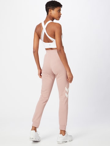 Effilé Pantalon de sport Hummel en rose