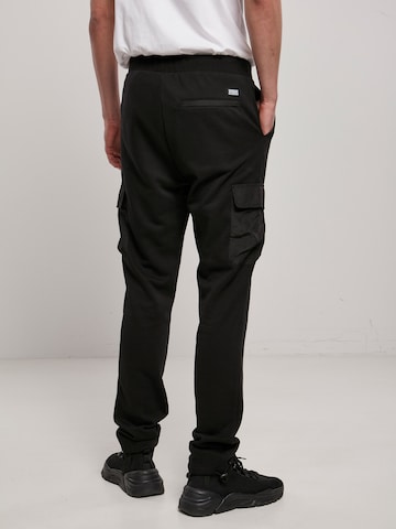 Regular Pantalon cargo 'Commuter' Urban Classics en noir