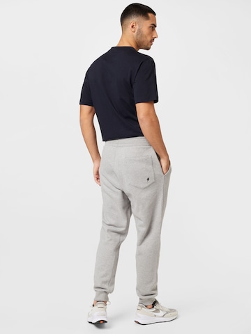 Tapered Pantaloni di Ocay in grigio