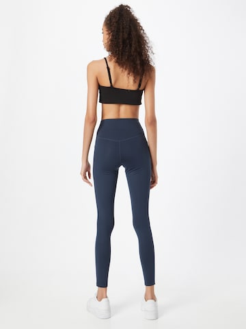 Girlfriend Collective Skinny Workout Pants in Blue