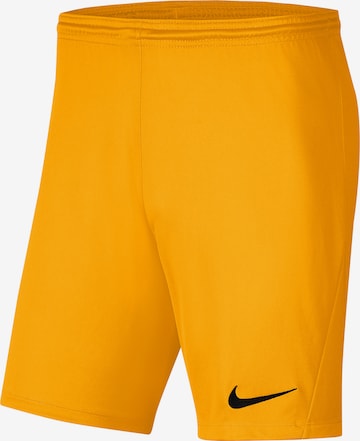 NIKE Regular Workout Pants in Yellow: front