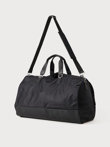 GUESS Travel bag 'MILANO' in Black: side