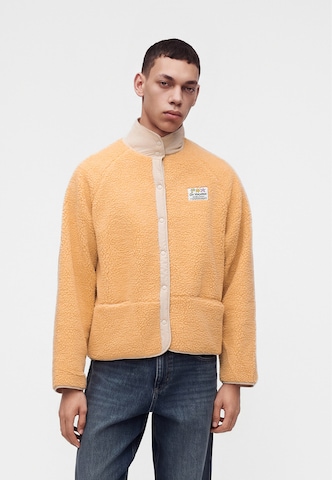Veste en polaire 'Holiday Service' On Vacation en orange : devant
