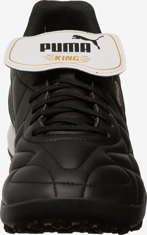 Chaussure de foot 'King Top' PUMA en noir