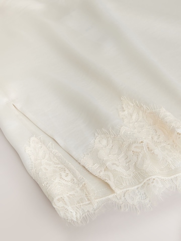 Top di Next in beige