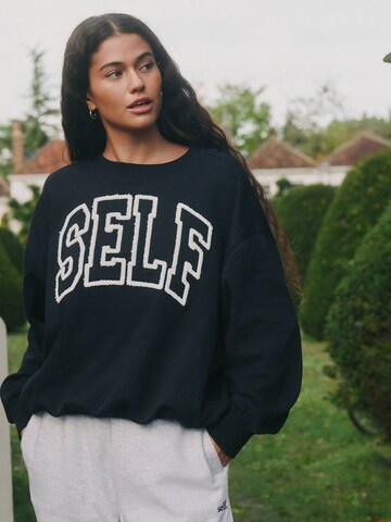Felpa di self. in nero