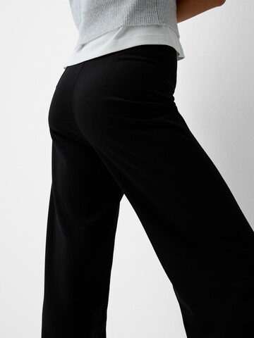 Bershka Loosefit Ráncos nadrág - fekete