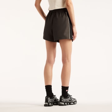 new balance Loosefit Broek in Zwart
