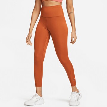 NIKE Skinny Workout Pants in Brown: front