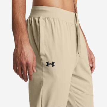UNDER ARMOUR Tapered Workout Pants in Beige