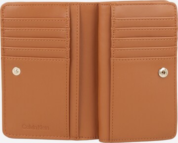 Porte-monnaies Calvin Klein en marron