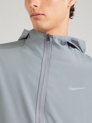 NIKE Training jacket 'Form' in Grey