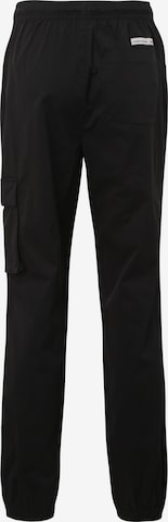 Effilé Pantalon cargo 'Turhal' FILA en noir