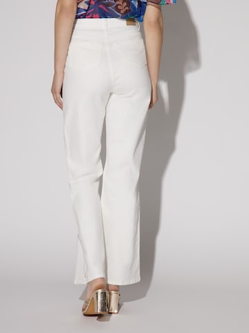 Evazați Jeans 'Ophelie' de la NAF NAF pe alb