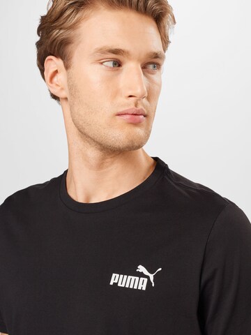 PUMA Functioneel shirt 'Essentials' in Zwart