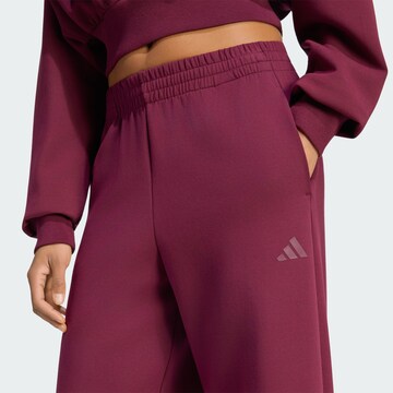 ADIDAS SPORTSWEAR - Pierna ancha Pantalón deportivo 'Soft Lux' en rojo