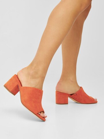 Bianco Pantolette 'CATE' in Orange