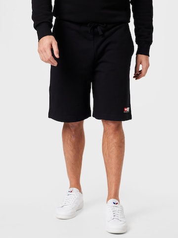 DIESEL Loose fit Pants in Black: front