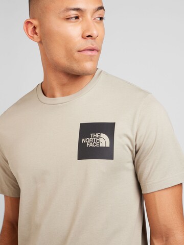 Maglietta di THE NORTH FACE in grigio