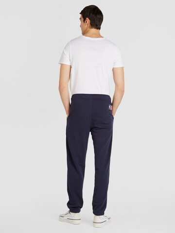 Champion Authentic Athletic Apparel Tapered Nadrág 'Elastic' - kék