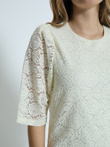 Robe 'Karoline' Peppercorn en blanc