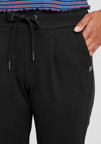 Oxmo - Tapered Calças 'Anita' em preto
