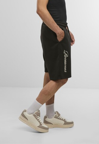 regular Pantaloni sportivi ' ' di ROCAWEAR in nero
