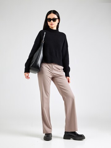 Bootcut Pantaloni di Monki in beige